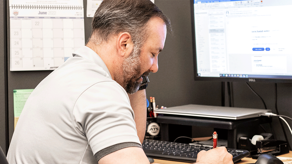 Fleet-Manager-Calling-Truck-Driver